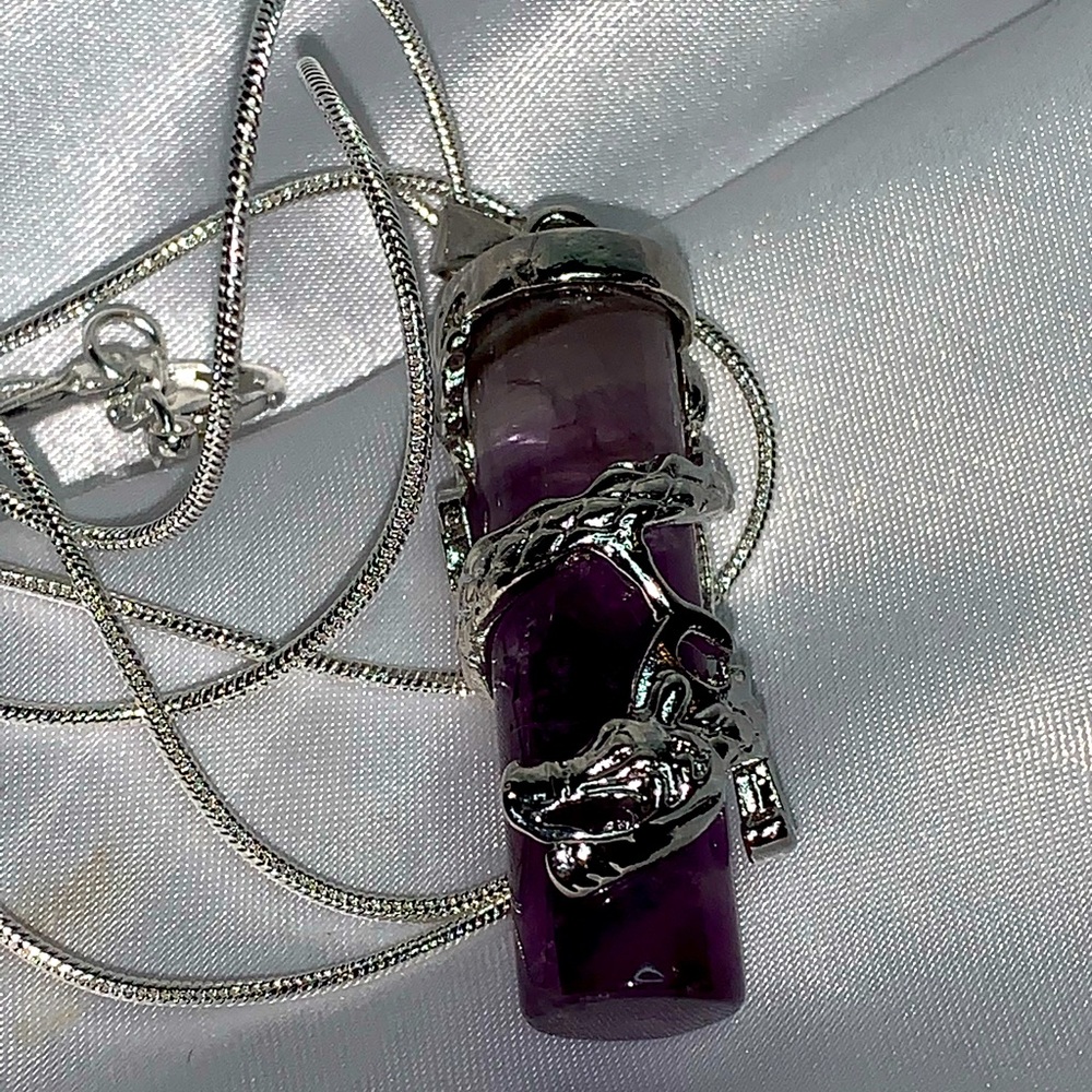 Amethyst and Silver dragon necklace.